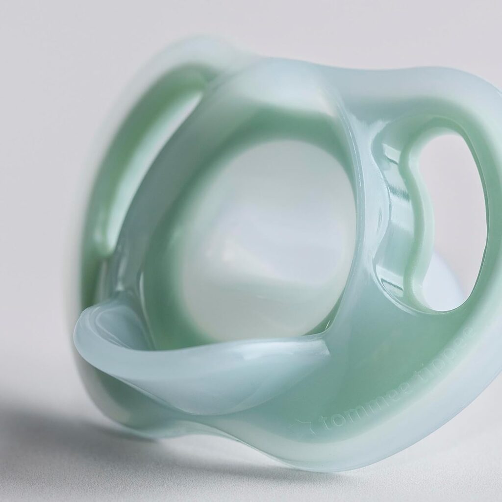 Tommee Tippee Ultra-Light Silicone Pacifier, 6-18 Months, Symmetrical One-Piece Design, BPA-Free Silicone Binkies, Clear/Pink/Yellow, Pack of 4 Tommee Tippee Ultra-Light Silicone Pacifier, 6-18 Months, Symmetrical One-Piece Design, BPA-Free Silicone Binkies, Clear/Pink/Yellow, Pack of 4