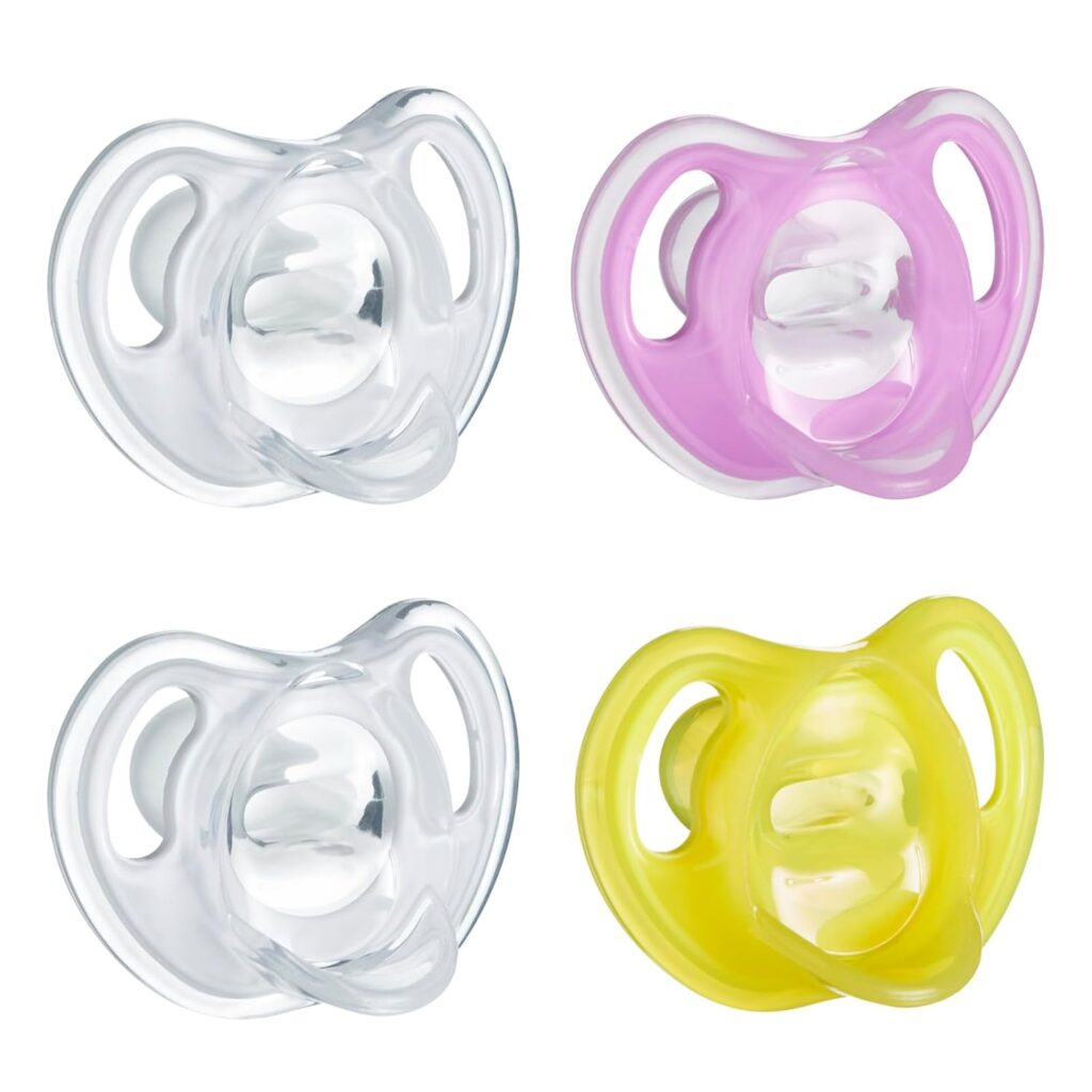 Tommee Tippee Ultra-Light Silicone Pacifier, 6-18 Months, Symmetrical One-Piece Design, BPA-Free Silicone Binkies, Clear/Pink/Yellow, Pack of 4 Tommee Tippee Ultra-Light Silicone Pacifier, 6-18 Months, Symmetrical One-Piece Design, BPA-Free Silicone Binkies, Clear/Pink/Yellow, Pack of 4